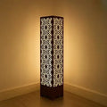 Wooden Floor Lamp with Geometric Cutouts Dark Brown Golden Glow
